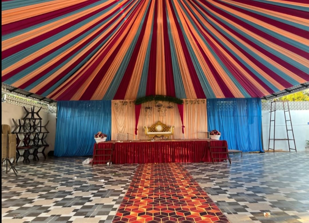Colourful draped stage inside the hall